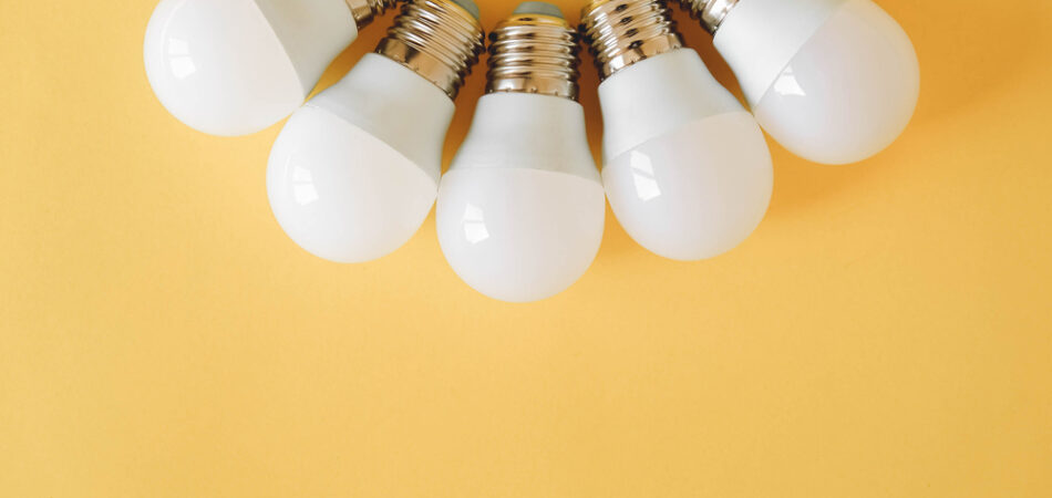 Led,light,bulbs,on,yellow,background.,top,view.,copy,,empty